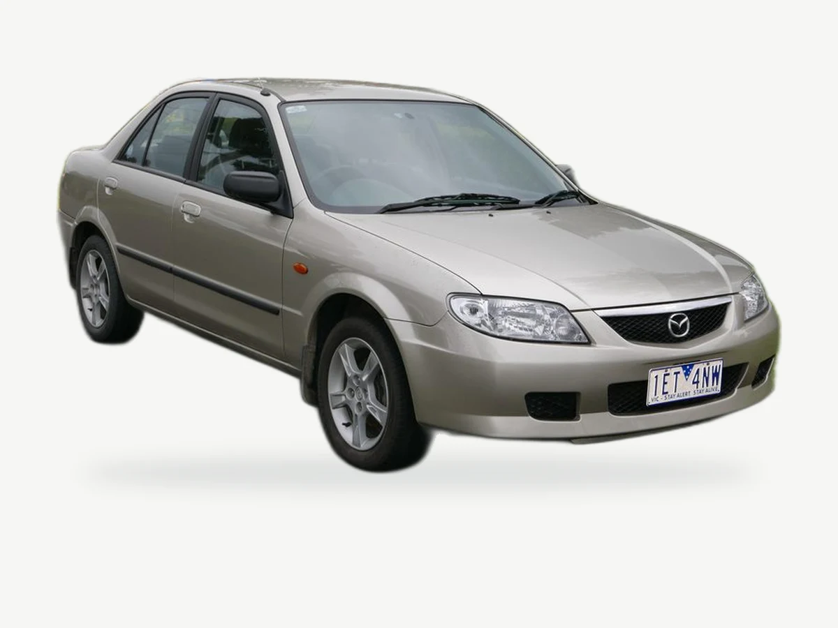 Representative Mazda 323 model range vehicle; trim and year may vary